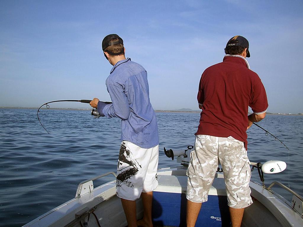 Hooked-up hard on a charging tuna within sight of the beach.  During winter, these fish come in nice and close. - Winter quick tripping for tuna © Lee Brake